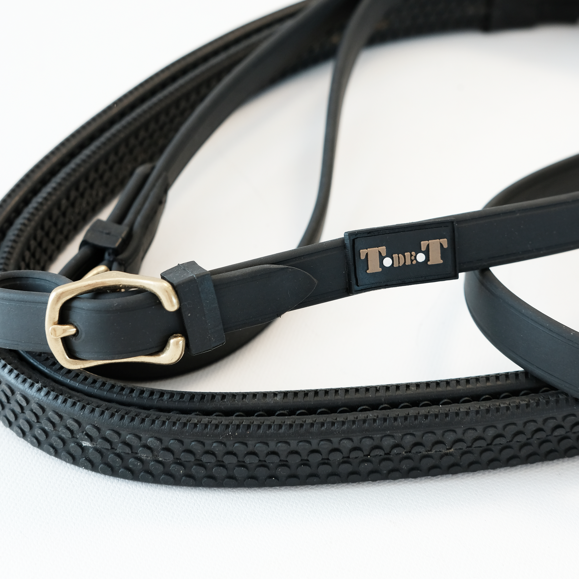 TdeT - Biotack® rubber reins large studs brown