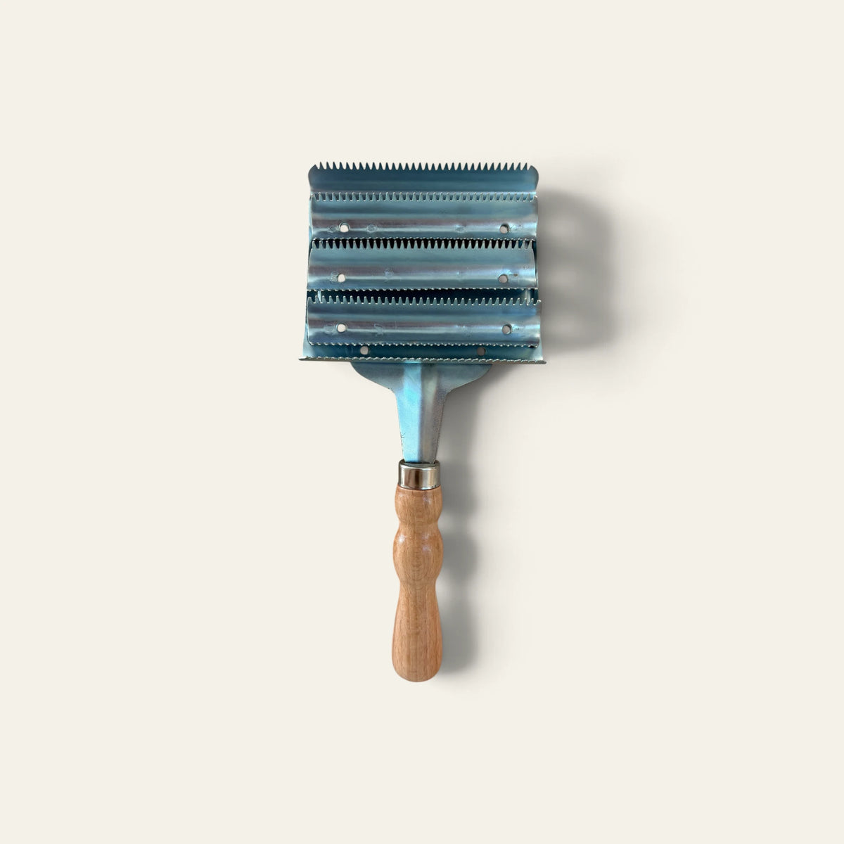 Étrille métallique carrée